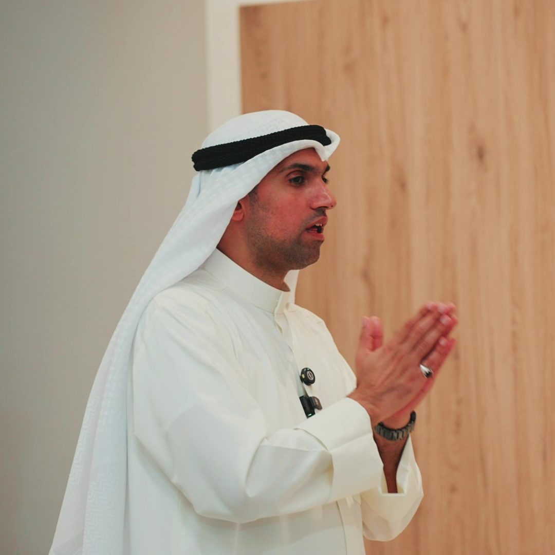 A photo of Hassan, founder and general manager giving his speech